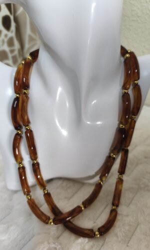 Colgante doble caramelo y perlas doradas